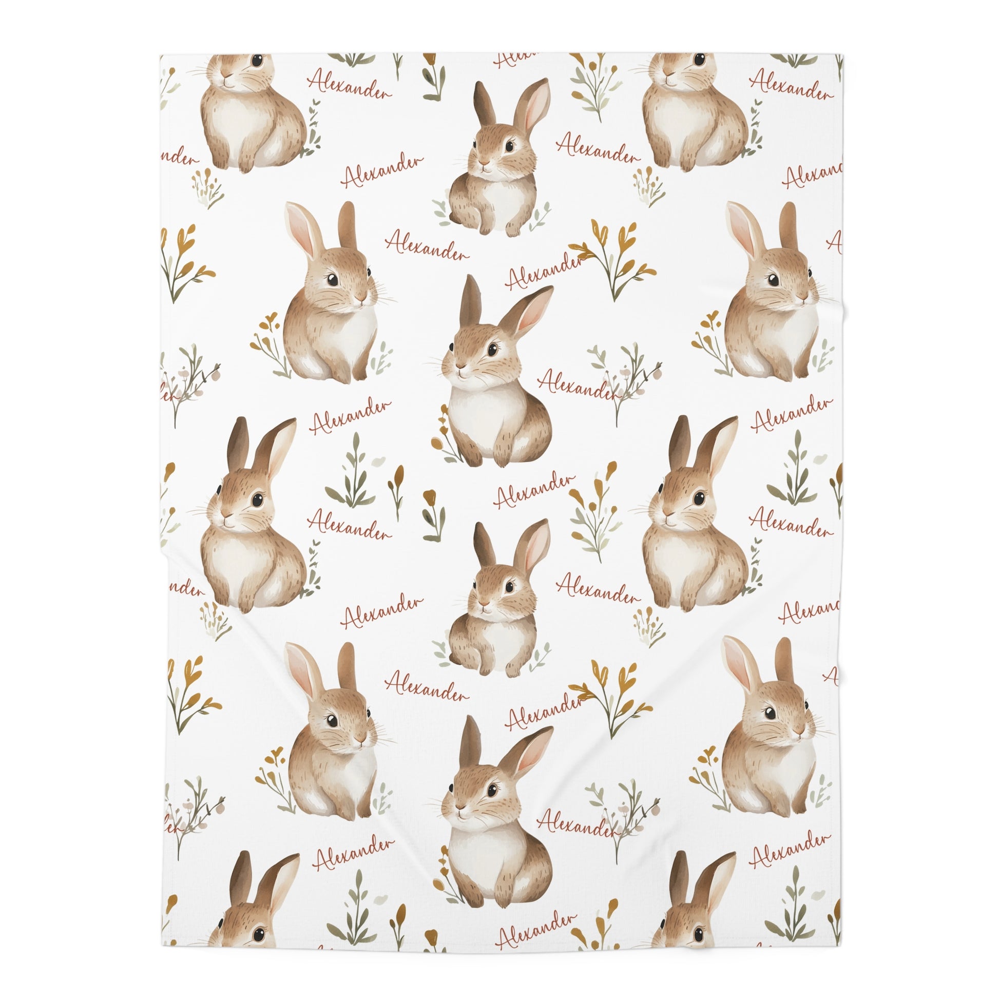 Patterned paper with illustrations of rabbits and the name 'Alexander' on a white background